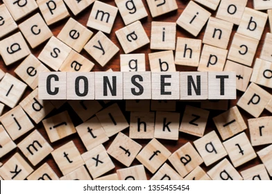 Wooden blocks forming the word consent