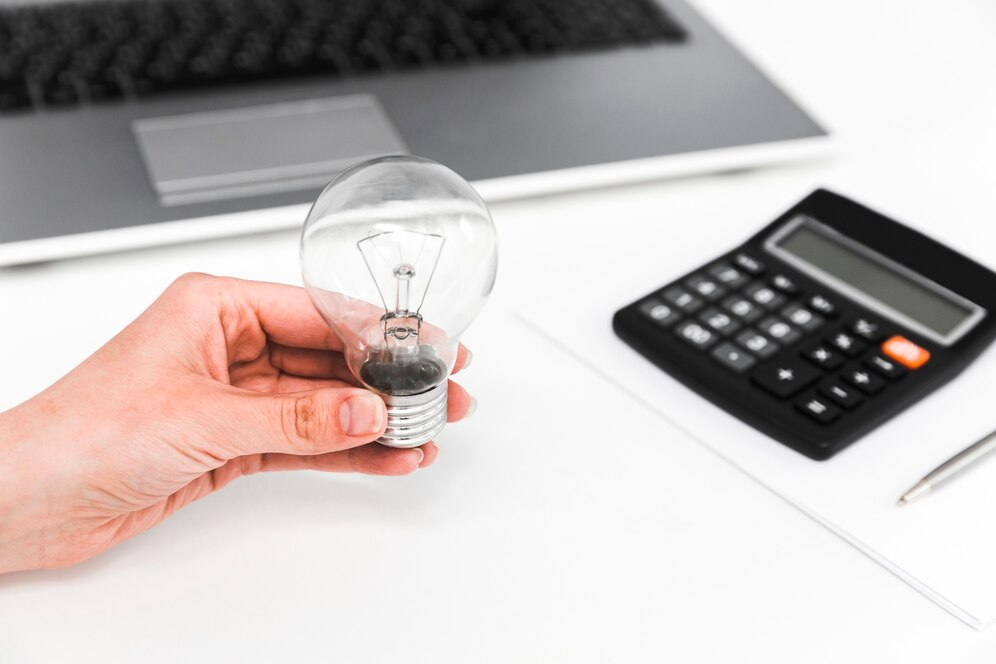 Hand holding a night bulb